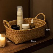 Woven Rattan Storage Basket with Handles styled in a natural home setting