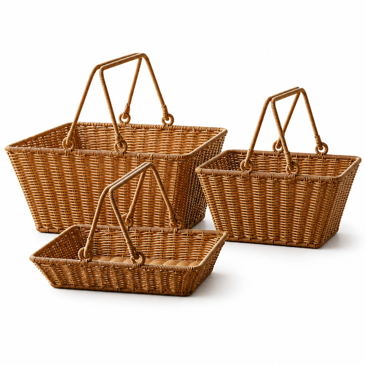 Three woven picnic baskets with dual handles on a white background
