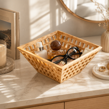 Openwork Bamboo Storage Basket styled in a natural home setting