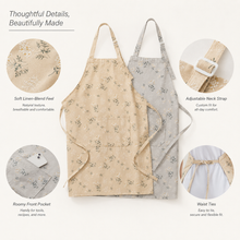 Floral apron detail chart showing adjustable neck strap, pocket, waist ties, and print