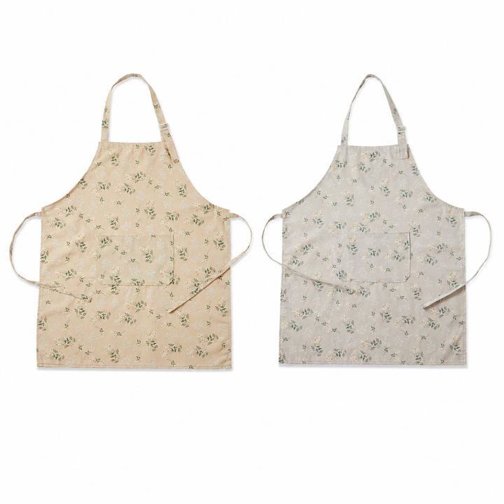 Warm beige and mist gray floral kitchen aprons on a white background
