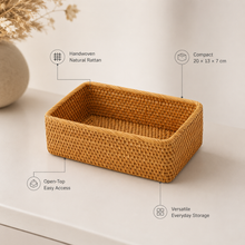 Open-top rectangular rattan storage basket showing the woven construction