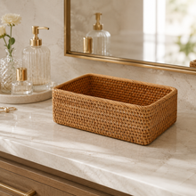 Rectangular rattan storage basket on a bathroom vanity